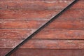 Red planks background with black metal bar Royalty Free Stock Photo