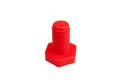 Red plastic bolt on white background