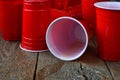 Red Plastic Drinking Cups and Spilled Beer Royalty Free Stock Photo