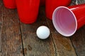 Red Plastic Drinking Cups and Spilled Beer Royalty Free Stock Photo