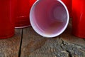 Red Plastic Drinking Cups and Spilled Beer Royalty Free Stock Photo