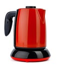 Red plastic electric kettle on white background Royalty Free Stock Photo