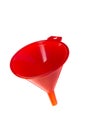 Red plastic funnel on white background