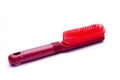 Red plastic hairbrush Royalty Free Stock Photo