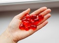 Red plastic hearts are in a hand Royalty Free Stock Photo