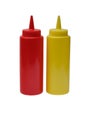 Red plastic ketchup and yellow mustard plastic bottle on white background. Royalty Free Stock Photo