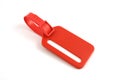 Red plastic luggage label