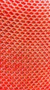 Red Plastic Mesh Texture Background Royalty Free Stock Photo