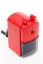 Red plastic pencil sharpener Royalty Free Stock Photo