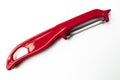 Red plastic potato peeler Royalty Free Stock Photo