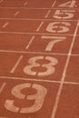 Red plastic runway and numbers in a sports ground, in Beijing, C