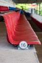 Red plastic seats. Royalty Free Stock Photo