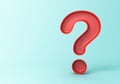 Red plastic shell question mark on cyan green pastel color background with shadow Royalty Free Stock Photo