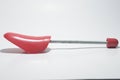 Red Plastic Shoe Tree on White Isolated Background Royalty Free Stock Photo