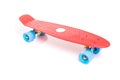 Red plastic skateboard on white background Royalty Free Stock Photo