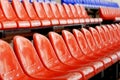 Red spectators seats at stadium