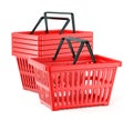 Red plastic supermarket baskets with two handles isolated on white background Royalty Free Stock Photo