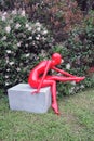Red plastic woman sculpture. Arch Moscow 2015