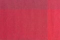 red plastic woven fabric samples, texture background Royalty Free Stock Photo