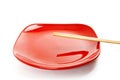 Red plate with chinese sticks