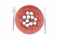 Red plate with Christmas silver ball Royalty Free Stock Photo