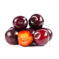 Red plum fruit isolated on white background. Fresh ripe washed Royalty Free Stock Photo