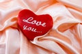 The red plush heart with the inscription: love you Royalty Free Stock Photo