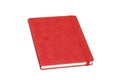 Red pocket leather daily planner with elastic banded.