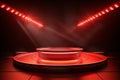 A red podium with spotlights on a black stage in a dark room Royalty Free Stock Photo