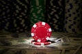 Red poker Chip at dollar background; Royalty Free Stock Photo