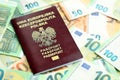 Red polish passport and big amount of european euro money bills Royalty Free Stock Photo