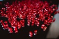 Pomegranate seeds scattered on the mirror