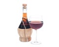 Red pomegranate wine in glass and straw wine bottle Royalty Free Stock Photo