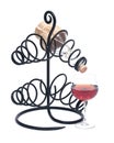 Red pomegranate wine, wine straw bottle and iron wine bottle holder Royalty Free Stock Photo