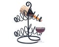 Red pomegranate wine, wine straw bottle and iron wine bottle holder Royalty Free Stock Photo