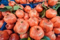 Red pomegranates for sale at street market Royalty Free Stock Photo