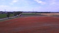 red poppyfield country, summer meadow. Gorgeous aerial top view flight drone