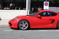 Red Porsche 718 Cayman S - Badly Parked Car Royalty Free Stock Photo