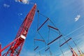 Red port crane against the blue sky Royalty Free Stock Photo