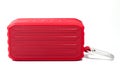 A red portable electronic speaker or radio