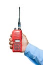 Red portable radio transceiver in hand Royalty Free Stock Photo