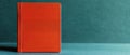 Red portfolio folder on turquoise minimal background document