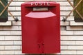 Red post box in Italy Royalty Free Stock Photo