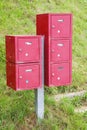 Red post boxes in a rural area Royalty Free Stock Photo