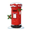 Red Postbox Covered in Snow with Holly Royalty Free Stock Photo