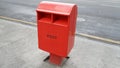 Red postbox on street in republic of Korea Royalty Free Stock Photo
