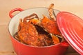 Red pot full of colossal chesapeake blue claw crabs