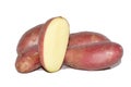 Red potatos and one cut Royalty Free Stock Photo