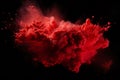 .Red Powder Explosion Abstract Against Dark Background