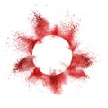Red powder explosion behind a round frame exploding on white background Royalty Free Stock Photo